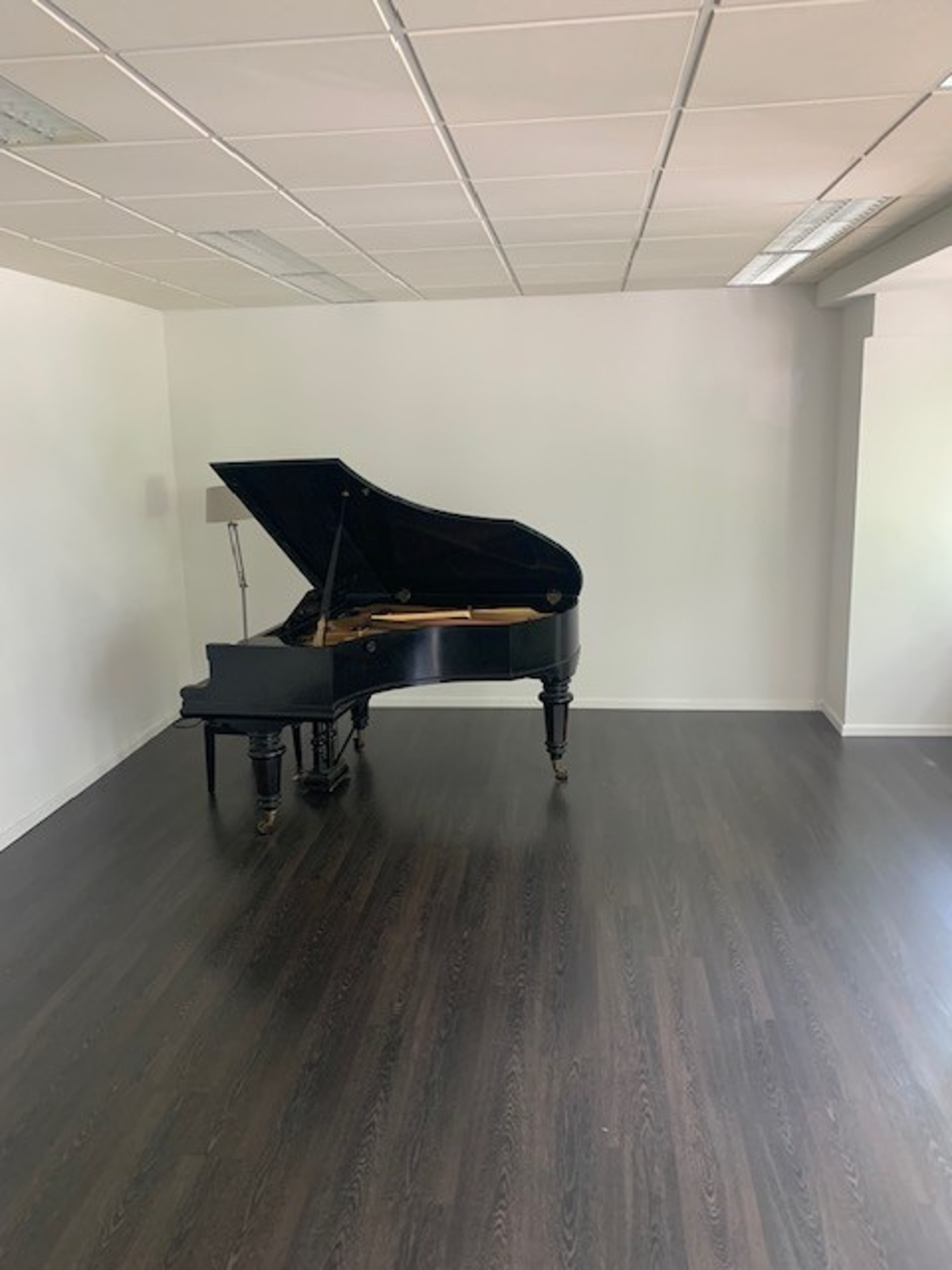 Light-filled studio with baby grand