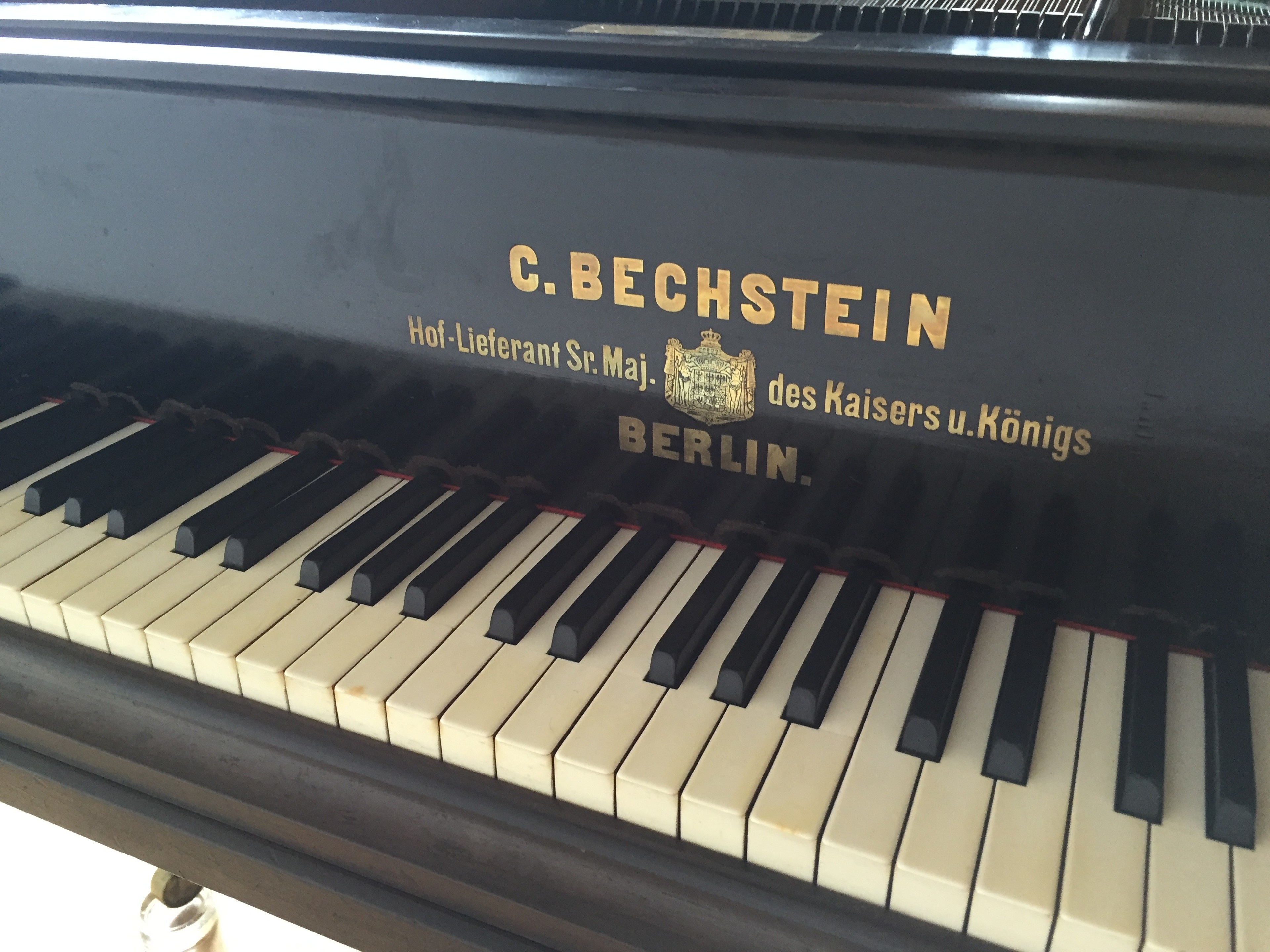 120 years old Bechstein grand piano in event room in small hotel — photo 3