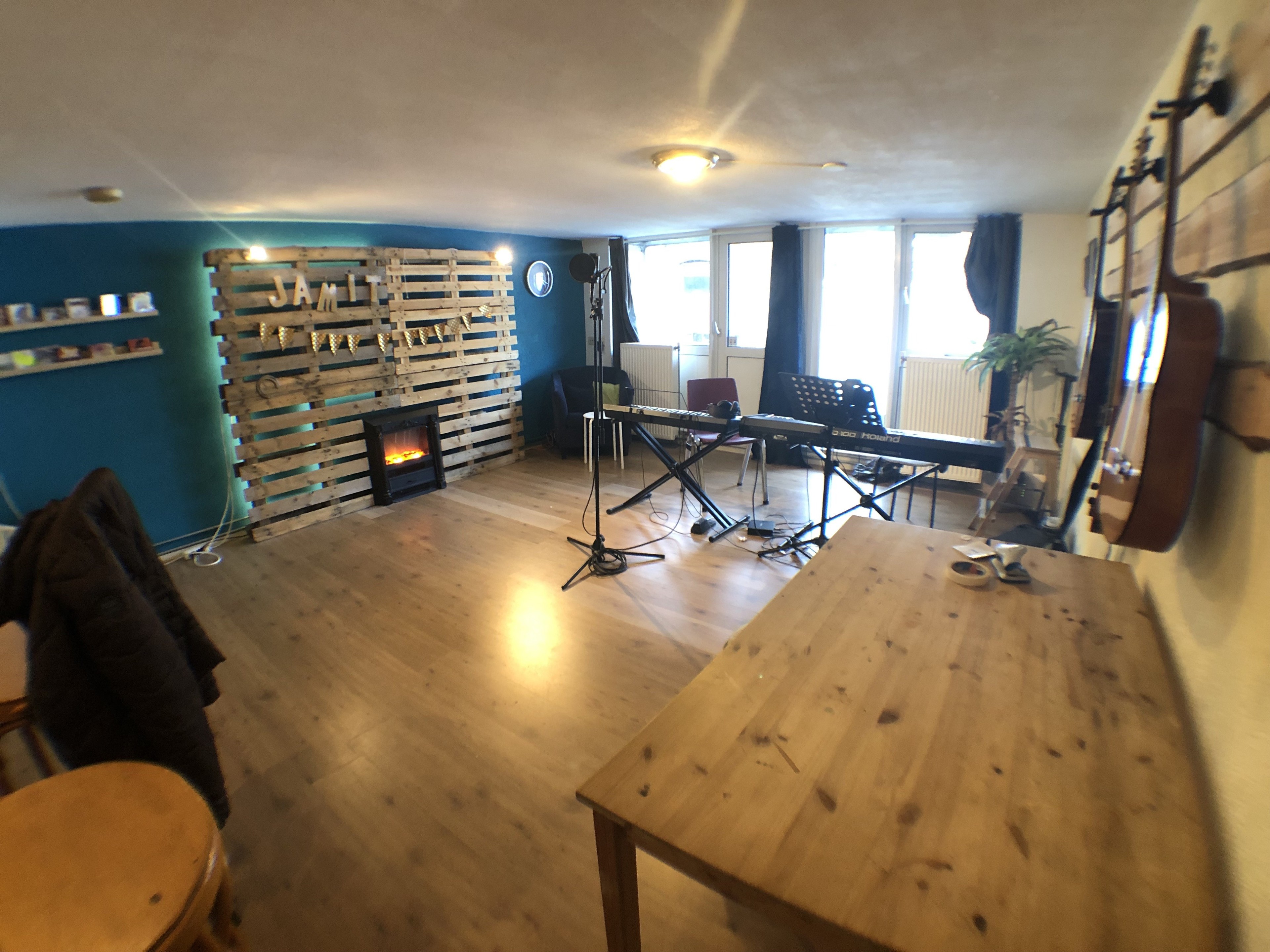Cozy Recording Studio with various instruments