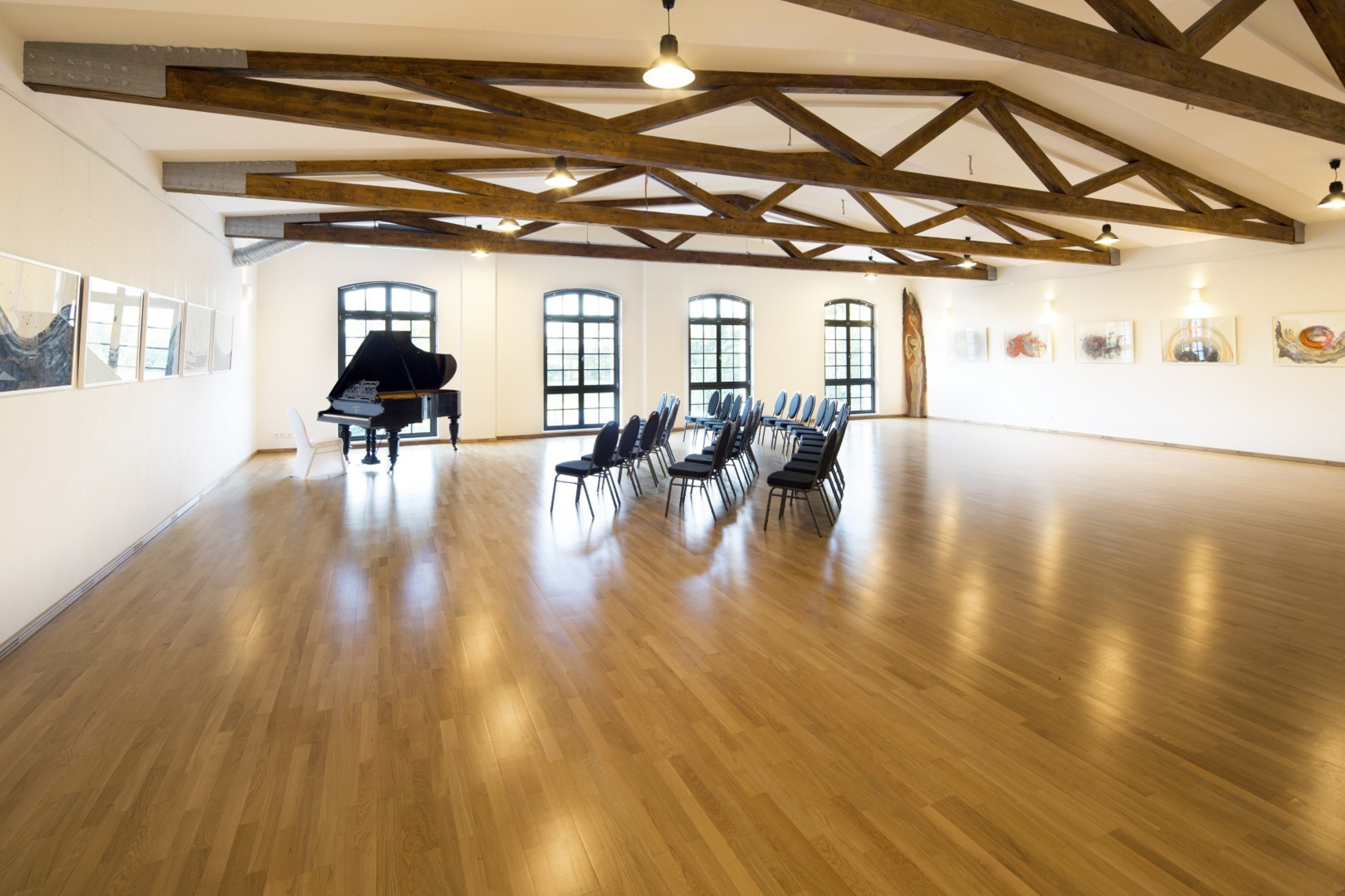 120 years old Bechstein grand piano in event room in small hotel