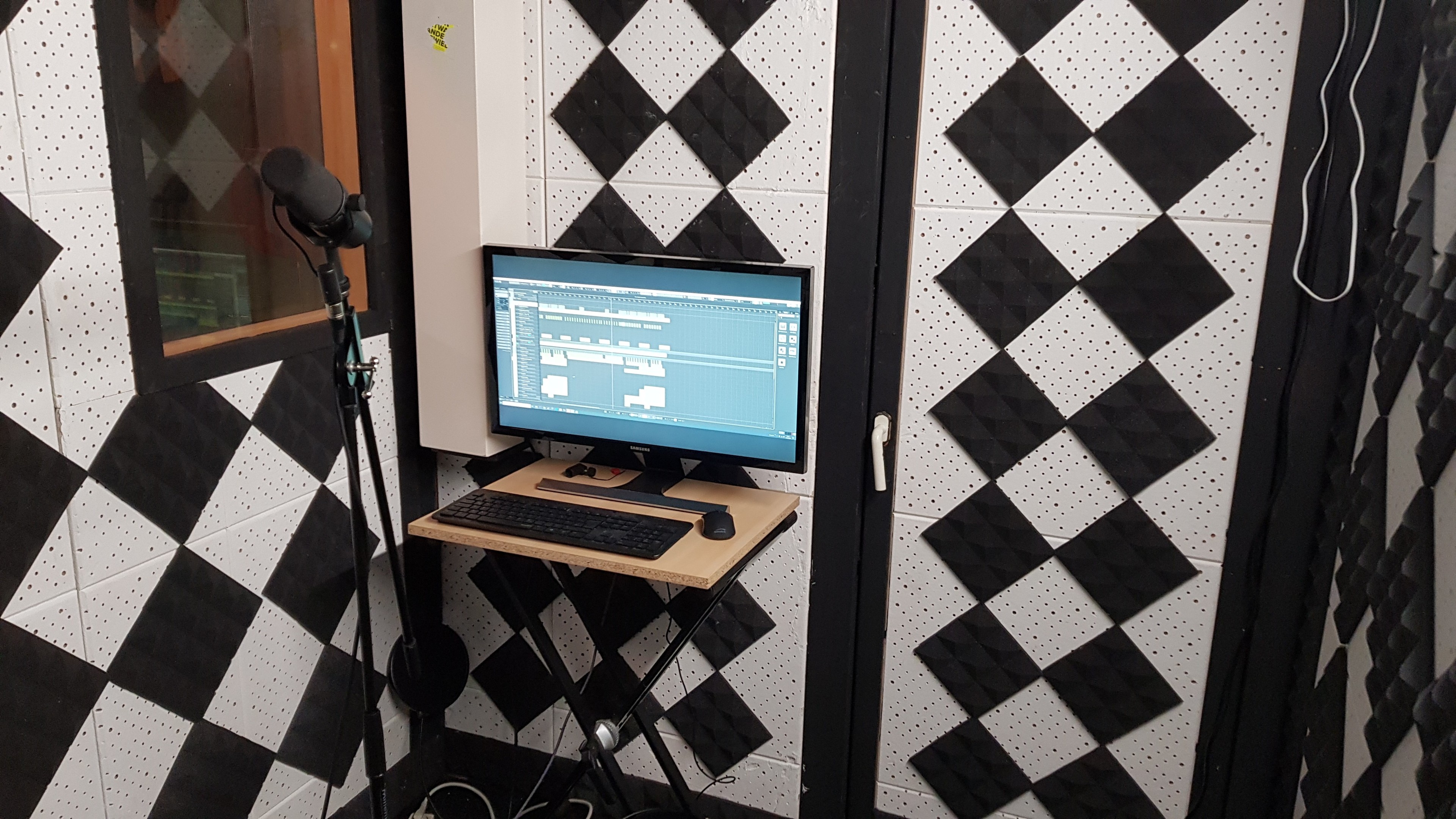 Cozy music studio with mixing area and vocal booth — photo 5