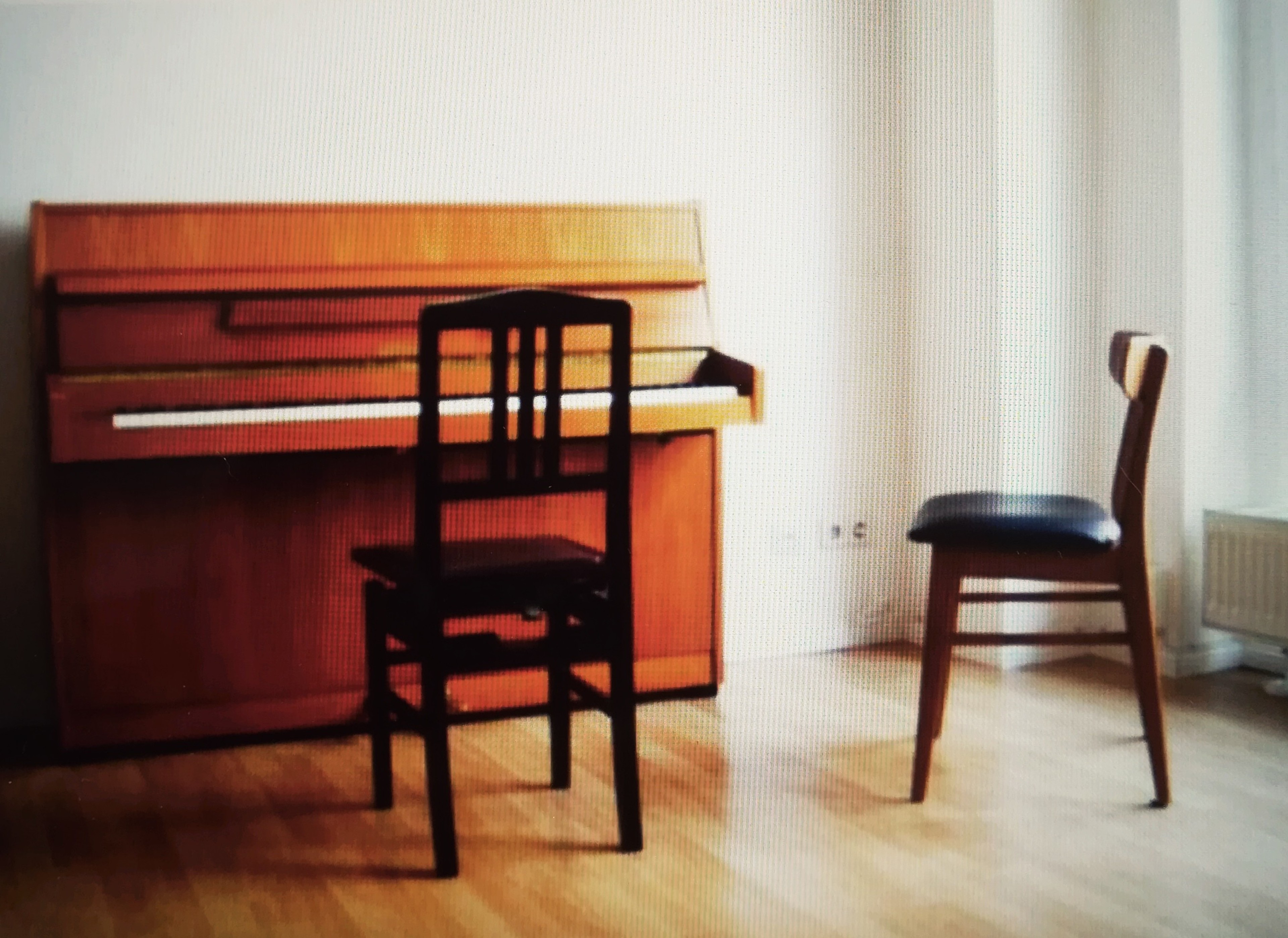 Big Bright Room with an Upright Piano