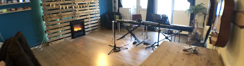Cozy Recording Studio with various instruments