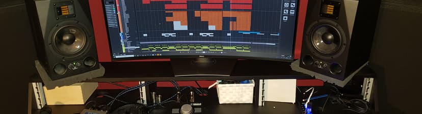 Cozy music studio with mixing area and vocal booth
